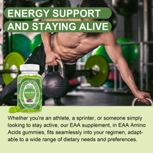 Chewable essential amino acid gummies in a bowl beside a water bottle and gym towel